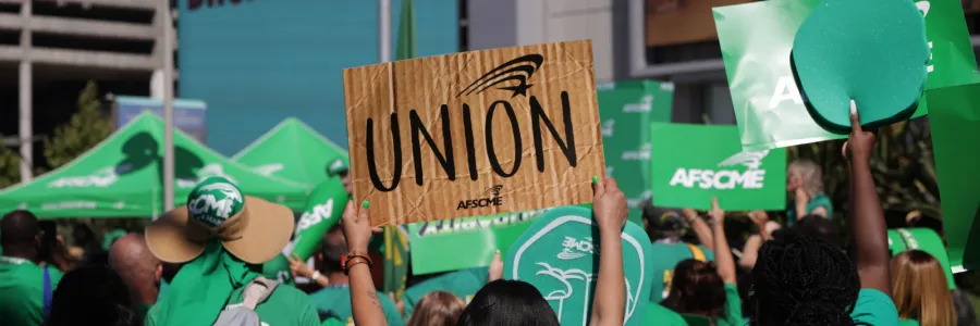 AFSCME Members Holding Signs